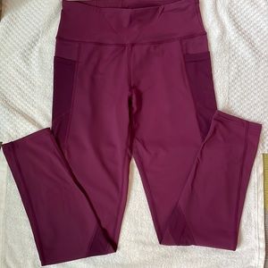 Purple electric yoga pants new with tags size medium side pocket perfection.